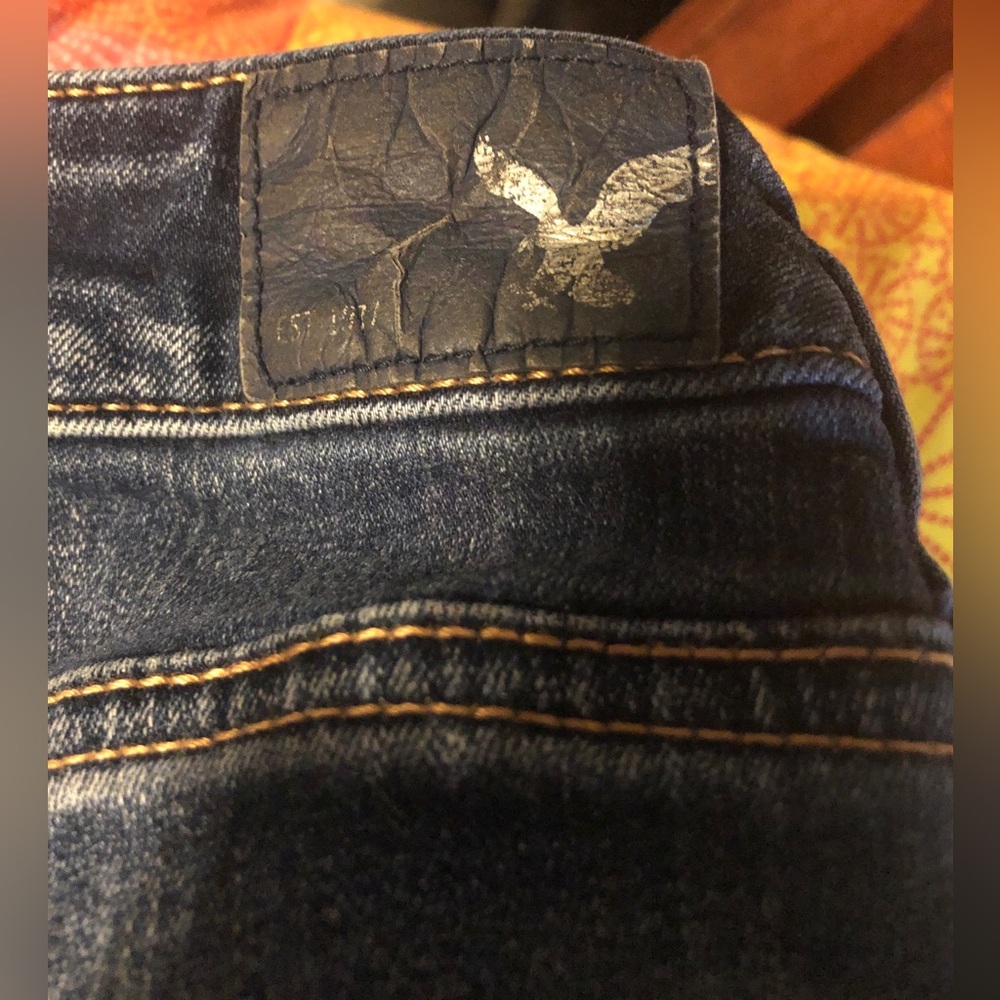 Dark Blue Women's Slim Super Stretch Jeans
American Eagle
Size 8
EUC